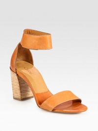 A simple design in fine Italian leather, with a wide ankle strap and powerful stacked heel. Stacked heel, 3¼ (80mm)Leather upperVelcro ankle strapLeather lining and solePadded insoleMade in Italy A simple design in fine Italian leather, with a wide ankle strap and powerful stacked heel. Stacked heel, 3¼ (80mm)Leather upperVelcro ankle strapLeather lining and solePadded insoleMade in Italy