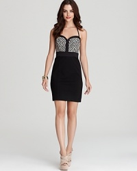 An ornately woven bodice lends an artisan feel to this summer-perfect GUESS dress, cut in a curve-defining silhouette. An ornately woven bodice lends an artisan feel to this summer-perfect GUESS dress, cut in a curve-defining silhouette.
