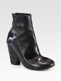 Instantly cool leather essential with a powerful stacked heel. Stacked heel, 4 (100mm)Leather upperBack zipLeather liningLeather and rubber solePadded insoleMade in ItalyOUR FIT MODEL RECOMMENDS ordering true size. Instantly cool leather essential with a powerful stacked heel. Stacked heel, 4 (100mm)Leather upperBack zipLeather liningLeather and rubber solePadded insoleMade in ItalyOUR FIT MODEL RECOMMENDS ordering true size.