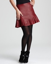 Supple leather lends lush dimension to a Bloomingdale's exclusive DKNY skirt, finished with a flared hemline for a striking, sculptural silhouette. Supple leather lends lush dimension to a Bloomingdale's exclusive DKNY skirt, finished with a flared hemline for a striking, sculptural silhouette.