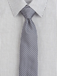 A power style for the power player, crafted in a luxurious silk blend, enhanced with a contrasting thin stripe pattern.About 2½ wide62% silk/38% cottonDry cleanMade in USA of Italian fabric A power style for the power player, crafted in a luxurious silk blend, enhanced with a contrasting thin stripe pattern.About 2½ wide62% silk/38% cottonDry cleanMade in USA of Italian fabric