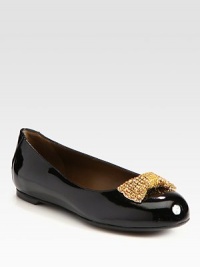 Add some sparkle to your look with this timeless patent leather silhouette, topped with a rhinestone-coated satin bow. Patent leather upper with satin rhinestone-covered bowLeather liningRubber solePadded insoleMade in ItalyOUR FIT MODEL RECOMMENDS ordering true size. Add some sparkle to your look with this timeless patent leather silhouette, topped with a rhinestone-coated satin bow. Patent leather upper with satin rhinestone-covered bowLeather liningRubber solePadded insoleMade in ItalyOUR FIT MODEL RECOMMENDS ordering true size.