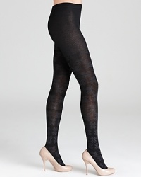 Let it snow from thigh to toe in HUE's cozy sweater tights, printed with season-right snowflakes. Let it snow from thigh to toe in HUE's cozy sweater tights, printed with season-right snowflakes.