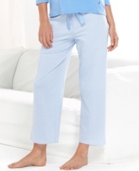 Lounge around in the easy style of Nautica's Knit Ankle pajama pants. This super soft cotton pair features an elastic waistband with a cute ribbon drawstring.