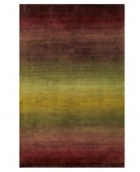 Crafted with an eye-catching ombre effect -- in which colors blend gradually into one another -- this hand-tufted area rug from Liora Manne has an organic flow that adds visual interest and irresistible allure to any floor. Crafted with an eye-catching ombre effect -- in which colors blend gradually into one another -- this hand-tufted area rug from Liora Manne has an organic flow that adds visual interest and irresistible allure to any floor.