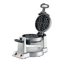 Get Sunday (and Monday, Tuesday, Wednesday...) off to a great start with delicious homemade waffles. Two griddles hasten cooking while extra-deep pockets produce the thickest Belgian waffles this side of the Atlantic. A rotary feature ensures even baking on the top and bottom and a browning control knob lets you pick a shade between light and dark. Get Sunday (and Monday, Tuesday, Wednesday...) off to a great start with delicious homemade waffles. Two griddles hasten cooking while extra-deep pockets produce the thickest Belgian waffles this side of the Atlantic. A rotary feature ensures even baking on the top and bottom and a browning control knob lets you pick a shade between light and dark.