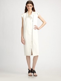 Epaulettes and an edgy, asymmetric front zip lend a modern look to this long canvas design.Stand collar with button closuresEpaulettesCap sleevesAsymmetrical front zipSide slash pocketsContrast back stripeSilk liningAbout 40½ from shoulder to hem99% rayon/1% silkDry cleanMade in ItalyModel shown is 5'9 (175cm) wearing US size 4. Epaulettes and an edgy, asymmetric front zip lend a modern look to this long canvas design.Stand collar with button closuresEpaulettesCap sleevesAsymmetrical front zipSide slash pocketsContrast back stripeSilk liningAbout 40½ from shoulder to hem99% rayon/1% silkDry cleanMade in ItalyModel shown is 5'9 (175cm) wearing US size 4.