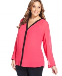 Snag a versatile look with DKNYC's long sleeve plus size blouse, featuring contrast trim-- dress it down with denim or up with trousers. Snag a versatile look with DKNYC's long sleeve plus size blouse, featuring contrast trim-- dress it down with denim or up with trousers.