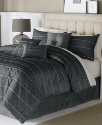 Connect the dots. In a cool gray color scheme, this Blair comforter set showcases an embroidered stripe and dot pattern with chenille embellishments to outfit your space in contemporary style. Connect the dots. In a cool gray color scheme, this Blair comforter set showcases an embroidered stripe and dot pattern with chenille embellishments to outfit your space in contemporary style.