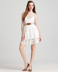 Spring's white trend is perfected with this simply beautiful Milly dress, rendered in lasercut cotton with a tiered ruffle hem. Belted at the waistline, the feminine silhouette is guaranteed to be the focal piece at your upcoming fête. Spring's white trend is perfected with this simply beautiful Milly dress, rendered in lasercut cotton with a tiered ruffle hem. Belted at the waistline, the feminine silhouette is guaranteed to be the focal piece at your upcoming fête.