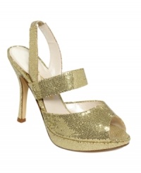 All the right moves. Lend sparkle to every step with the glittering Wright evening sandals by Caparros. All the right moves. Lend sparkle to every step with the glittering Wright evening sandals by Caparros.