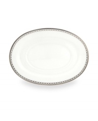 Designed to mimic a strand of lustrous pearls. With imitation pearl accents and platinum rims on fine bone china. Designed to mimic a strand of lustrous pearls. With imitation pearl accents and platinum rims on fine bone china.