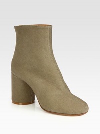 Comfy-chic cotton in an ankle-grazing silhouette with an exposed back zipper and chunky self-covered heel. Self-covered heel, 3 (75mm)Cotton upperBack zipperLeather lining and solePadded insoleMade in ItalyOUR FIT MODEL RECOMMENDS ordering one size up as this style runs small. Comfy-chic cotton in an ankle-grazing silhouette with an exposed back zipper and chunky self-covered heel. Self-covered heel, 3 (75mm)Cotton upperBack zipperLeather lining and solePadded insoleMade in ItalyOUR FIT MODEL RECOMMENDS ordering one size up as this style runs small.