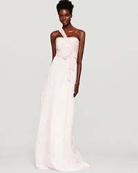 In crinkled silk chiffon, Amsale's long dress lends a statuesque look in a strapless-meets-one-shouldered silhouette. In crinkled silk chiffon, Amsale's long dress lends a statuesque look in a strapless-meets-one-shouldered silhouette.