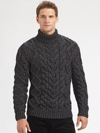 A chunky, cable-knit turtleneck, shaped in a fine wool blend, offers superior warmth and comfort on those brisk, winter days.Ribbed knit cuffs and hem56% wool/44% polyesterDry cleanImported A chunky, cable-knit turtleneck, shaped in a fine wool blend, offers superior warmth and comfort on those brisk, winter days.Ribbed knit cuffs and hem56% wool/44% polyesterDry cleanImported