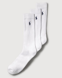 Polo Ralph Lauren set of three stretch cotton crew socks feature a cushioned foot and ribbed top. Polo player embroidered detail. Three pairs of socks per pair. Polo Ralph Lauren set of three stretch cotton crew socks feature a cushioned foot and ribbed top. Polo player embroidered detail. Three pairs of socks per pair.