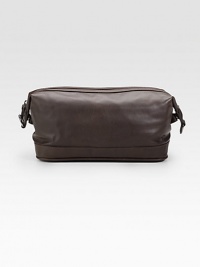 EXCLUSIVELY OURS. We've taken the classic toiletry bag and given it a handsome update in calfskin leather with a reinforced bottom and waterproof lining. Top zip closure Lined in waterproof taffeta 9W X 7¼H X 3¾D Imported EXCLUSIVELY OURS. We've taken the classic toiletry bag and given it a handsome update in calfskin leather with a reinforced bottom and waterproof lining. Top zip closure Lined in waterproof taffeta 9W X 7¼H X 3¾D Imported