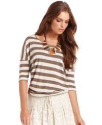 In a slouchy shape, this Kensie striped top is perfectly paired with all your fave bottoms! In a slouchy shape, this Kensie striped top is perfectly paired with all your fave bottoms!