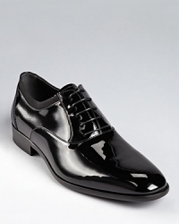 Smooth, shiny patent leather shoes add and extra dimension of style to your refined attire. Smooth, shiny patent leather shoes add and extra dimension of style to your refined attire.