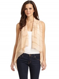 THE LOOKOpen frontSleevelessAsymmetrical hemlineLeather back panelTHE FITAbout 32 from shoulder to hemTHE MATERIALFront: silkBack: leatherCARE & ORIGINDry cleanImportedModel shown is 5'9 (175cm) wearing US size Small. THE LOOKOpen frontSleevelessAsymmetrical hemlineLeather back panelTHE FITAbout 32 from shoulder to hemTHE MATERIALFront: silkBack: leatherCARE & ORIGINDry cleanImportedModel shown is 5'9 (175cm) wearing US size Small.