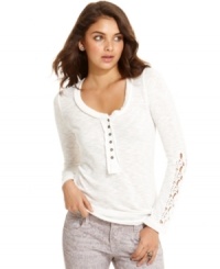 Slub-knit fabric and crochet insets at the sleeves make this henley top from American Rag a style you'll wear again and again! Slub-knit fabric and crochet insets at the sleeves make this henley top from American Rag a style you'll wear again and again!