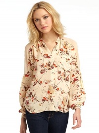 THE LOOKFloral designV-neckConcealed front button closureLong button cuff sleeves Sheer panels with ruffled accents on shouldersTHE FITAbout 22 from shoulder to hemTHE MATERIALSilkCARE & ORIGINDry cleanImportedModel shown is 5'10 (177cm) wearing US size Small. THE LOOKFloral designV-neckConcealed front button closureLong button cuff sleeves Sheer panels with ruffled accents on shouldersTHE FITAbout 22 from shoulder to hemTHE MATERIALSilkCARE & ORIGINDry cleanImportedModel shown is 5'10 (177cm) wearing US size Small.
