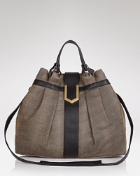 Done in rich leather, this ALLIBELLE satchel works a downtown vibe. Adding to the allure? A simple yet spacious shape which features a lined interior with 5 pockets. Done in rich leather, this ALLIBELLE satchel works a downtown vibe. Adding to the allure? A simple yet spacious shape which features a lined interior with 5 pockets.