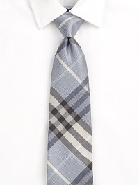 A neatly woven silk tie in a signature check pattern is destined to command attention in the boardroom and beyond.About 3 wideMulberry silkDry cleanMade in Great Britain A neatly woven silk tie in a signature check pattern is destined to command attention in the boardroom and beyond.About 3 wideMulberry silkDry cleanMade in Great Britain