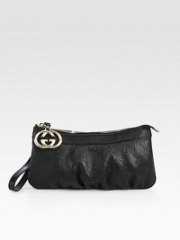 Wristlet with interlocking G charm in guccissima leather with leather trim and nickel hardware.Wristlet strap, 4 drop Zip-top closure Fully lined 8¾W X 4½H X ½D Made in Italy Wristlet with interlocking G charm in guccissima leather with leather trim and nickel hardware.Wristlet strap, 4 drop Zip-top closure Fully lined 8¾W X 4½H X ½D Made in Italy