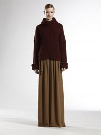 Chunky knit wool, in an oversized silhouette.Foldover turtleneckDropped shoulderLong sleeves with foldover cuffsWoolDry cleanMade in ItalyModel shown is 5'11 (180cm) wearing US size Small. Chunky knit wool, in an oversized silhouette.Foldover turtleneckDropped shoulderLong sleeves with foldover cuffsWoolDry cleanMade in ItalyModel shown is 5'11 (180cm) wearing US size Small.