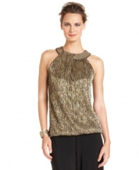 Alfani's latest top looks decadent with a metallic finish and beautifully beaded neckline. Alfani's latest top looks decadent with a metallic finish and beautifully beaded neckline.