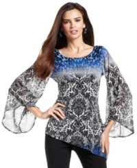 Alfani makes a dramatic statement with a mixed-print top, combining a bold animal motif with a luxurious fleur-de-lis-inspired design on an asymmetrical silhouette. (Clearance)