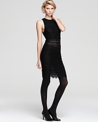 A sheer cocktail party stunner, this new Alice + Olivia dress was designed to attract double-takes with intricate beading, sequin details and sheer embroidered cutouts on front and back. A sheer cocktail party stunner, this new Alice + Olivia dress was designed to attract double-takes with intricate beading, sequin details and sheer embroidered cutouts on front and back.
