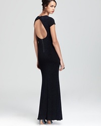 A statuesque beauty with a striking open back, this runway-ready Alice + Olivia Dress, was designed to dazzle thanks to a floor-length drape and a refined hint of metallic shine. A statuesque beauty with a striking open back, this runway-ready Alice + Olivia Dress, was designed to dazzle thanks to a floor-length drape and a refined hint of metallic shine.