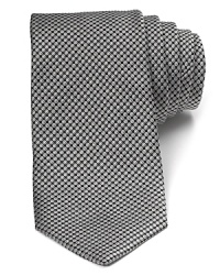 Patterned with bubble-like dots, this dapper tie invigorates your professional look with a dose of plush Italian silk. Patterned with bubble-like dots, this dapper tie invigorates your professional look with a dose of plush Italian silk.