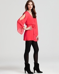 A wispy, silky-light DV Dolce Vita dress, cinched at the waist for a flattering silhouette, with alluring cut-out sleeves--let the fall festivities begin! A wispy, silky-light DV Dolce Vita dress, cinched at the waist for a flattering silhouette, with alluring cut-out sleeves--let the fall festivities begin!