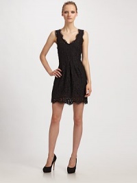 Elegantly simple, and simply sensational in sheer, scalloped lace.Sleeveless Scalloped V-neckline Set-on waist Scalloped hem Side zipper Fully lined About 18 from natural waist 58% nylon/42% cotton Dry clean Imported Elegantly simple, and simply sensational in sheer, scalloped lace.Sleeveless Scalloped V-neckline Set-on waist Scalloped hem Side zipper Fully lined About 18 from natural waist 58% nylon/42% cotton Dry clean Imported