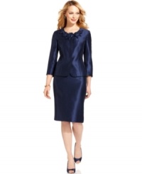 Shimmering shantung makes this skirt suit by Kasper look luxe, while seamed details add a tailored look. A band of fabric flowers at the neck is a pretty finishing touch. Shimmering shantung makes this skirt suit by Kasper look luxe, while seamed details add a tailored look. A band of fabric flowers at the neck is a pretty finishing touch.