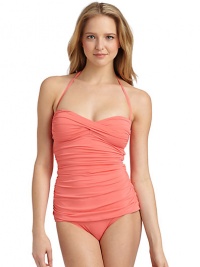 THE LOOKCrossover front bandeauSide ruchingCutout backBack tie closureTHE MATERIAL87% nylon/13% spandexFully linedCARE & ORIGINHand washImported THE LOOKCrossover front bandeauSide ruchingCutout backBack tie closureTHE MATERIAL87% nylon/13% spandexFully linedCARE & ORIGINHand washImported