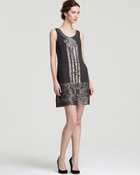 Boasting an intricate pattern of beads and sequins, this Adrianna Papell dress is reminiscent of 20s-era glamour.
