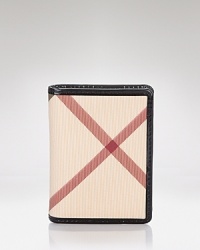 Burberry's sought-after check adorns this all-essential card case. Burberry's sought-after check adorns this all-essential card case.