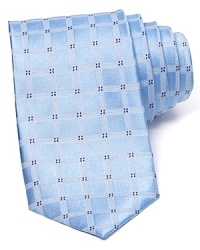A micro diamond pattern accents a grid jacquard on this silk tie from The Men's Store at Bloomingdale's. A micro diamond pattern accents a grid jacquard on this silk tie from The Men's Store at Bloomingdale's.