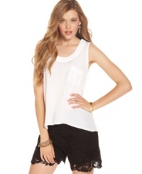 The breezy, relaxed silhouette and slight high-low hem of this sleeveless top from Ali & Kris makes this piece a must-have for your closet! The breezy, relaxed silhouette and slight high-low hem of this sleeveless top from Ali & Kris makes this piece a must-have for your closet!