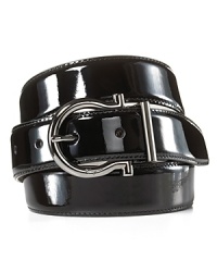A patent leather belt with classic sheen for a super-polished look, featuring a silver-tone Gancini logo buckle for an extra stroke of refinement. A patent leather belt with classic sheen for a super-polished look, featuring a silver-tone Gancini logo buckle for an extra stroke of refinement.
