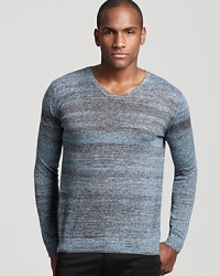Muted gray and light blue stripes add depth to a fashion-forward slim fit sweater from Theory. Muted gray and light blue stripes add depth to a fashion-forward slim fit sweater from Theory.