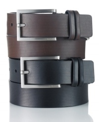 With a look so sleek, you'll want this Calvin Klein belt in black and brown. With a look so sleek, you'll want this Calvin Klein belt in black and brown.