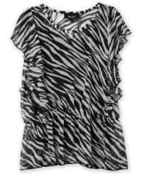 Jungle queen. She can add some exotic flair to her weekly rotation with this peplum top from BCX. Jungle queen. She can add some exotic flair to her weekly rotation with this peplum top from BCX.