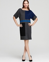 Geometric color blocking lends a modern look to Anne Klein's dolman-sleeved dress. Geometric color blocking lends a modern look to Anne Klein's dolman-sleeved dress.