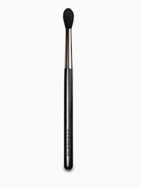 Burberry Eye Brush No. 09 is a long-bristled blending brush with a slight point. Made from ultrasoft goat hair, it is used to apply eyeshadow at the tip to create a deeper, but soft, socket line. Used by Burberry Beauty makeup artists to create an effortless smoky eye look. Burberry Eye Brush No. 09 is a long-bristled blending brush with a slight point. Made from ultrasoft goat hair, it is used to apply eyeshadow at the tip to create a deeper, but soft, socket line. Used by Burberry Beauty makeup artists to create an effortless smoky eye look.