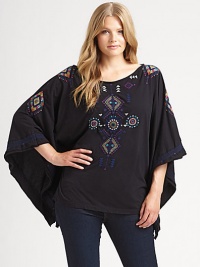 It's the poncho re-imagined with vivid embroidery, a relaxed fit and unquestionable charm.Round neckPull-on styleAbout 28 from shoulder to hemCottonMachine washImported It's the poncho re-imagined with vivid embroidery, a relaxed fit and unquestionable charm.Round neckPull-on styleAbout 28 from shoulder to hemCottonMachine washImported